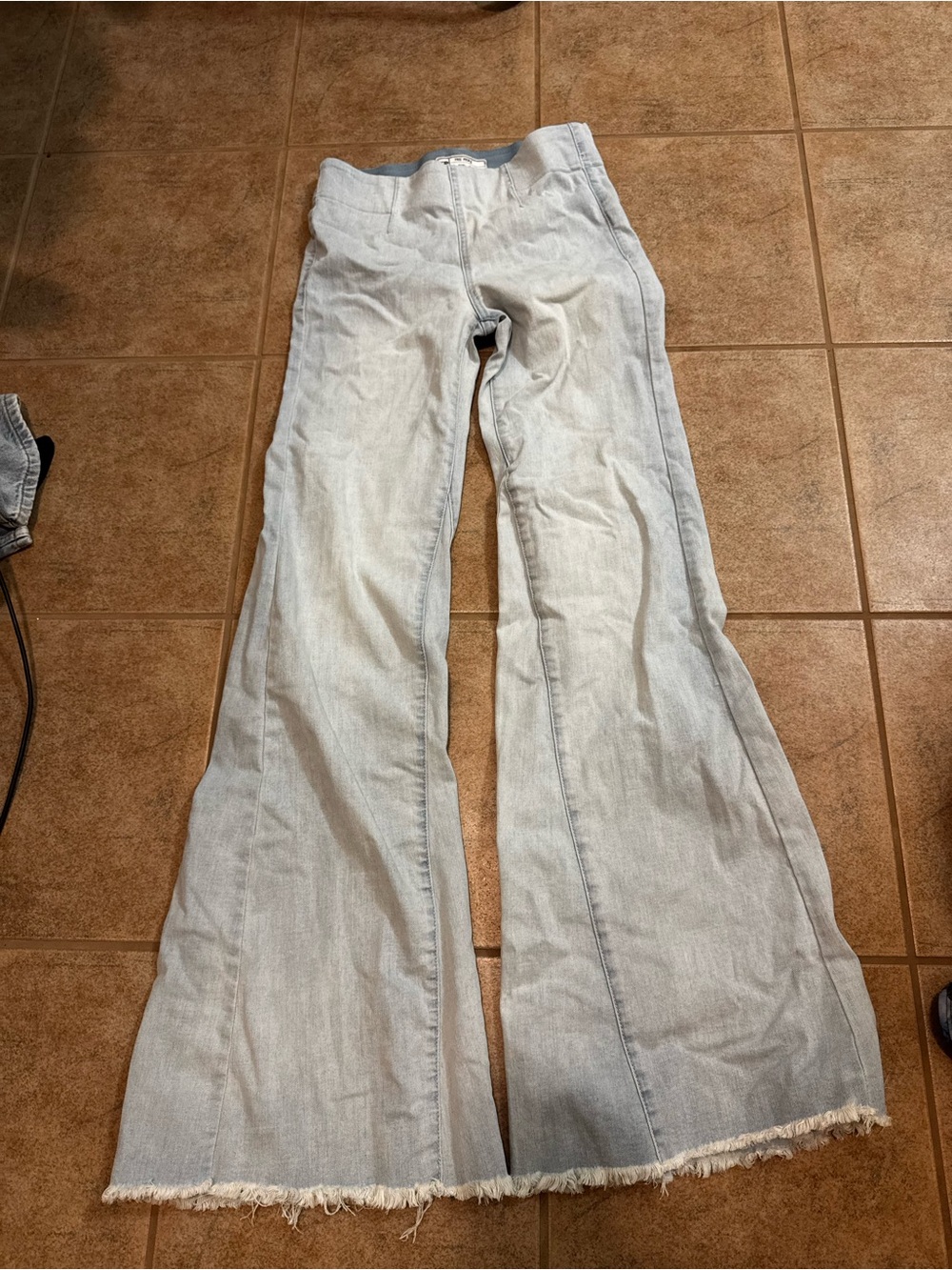Free People Pale Blue Flared Jeans with Raw Hem